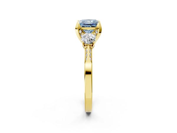 Yellow gold Fancy Blue Princess Cut Brilliant Three-Stone Diamond Ring with Pavé Band and Four-Prong Setting
