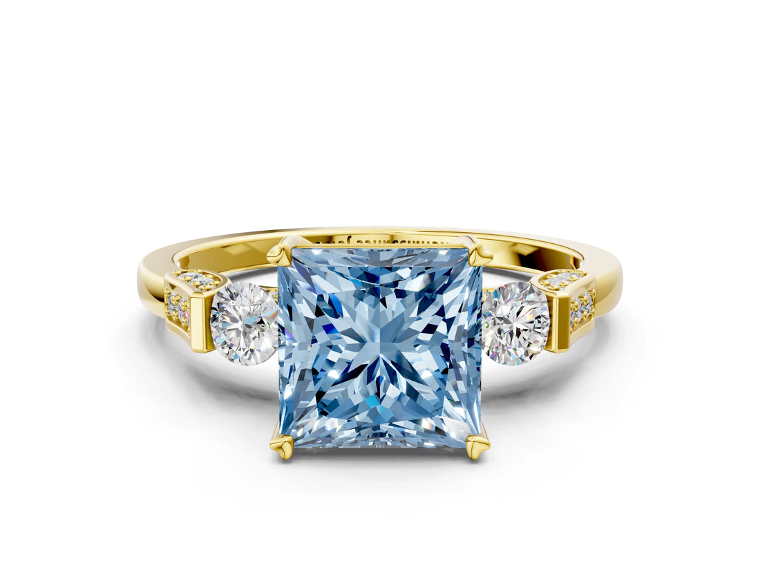 Yellow gold Fancy Blue Princess Cut Brilliant Three-Stone Pave Band with Four-Prong Setting