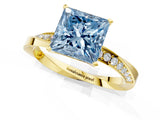 Yellow gold Fancy Blue Princess Cut Diamond Engagement Ring with Side Stone Accents and Four-Prong Setting_97