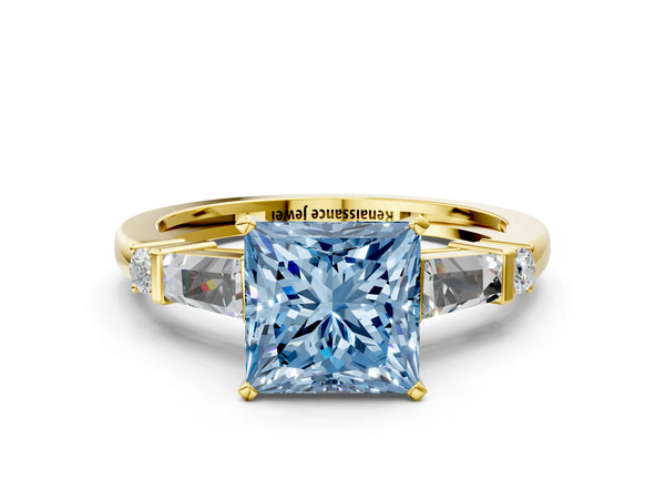 Yellow gold Fancy Blue Princess  Cut Diamond Ring with Baguette Side Stones, Channel Set Band, and Four-Prong Setting