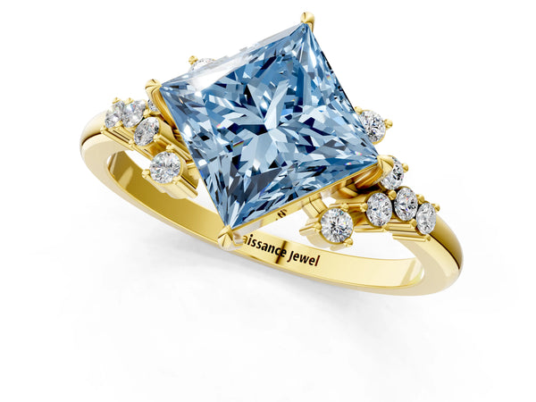 Yellow gold Fancy Blue Princess Cut Diamond Ring with Side Stones and Four-Prong Setting