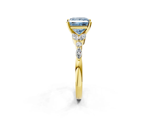 Yellow gold Fancy Blue Princess Cut Diamond Solitaire Ring with Side Stones and Four-Prong Setting