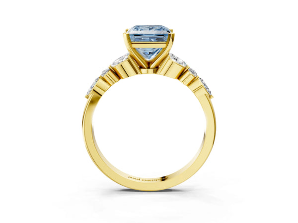 Yellow gold Fancy Blue Princess Cut Diamond Solitaire Ring with Side Stones and Four-Prong Setting