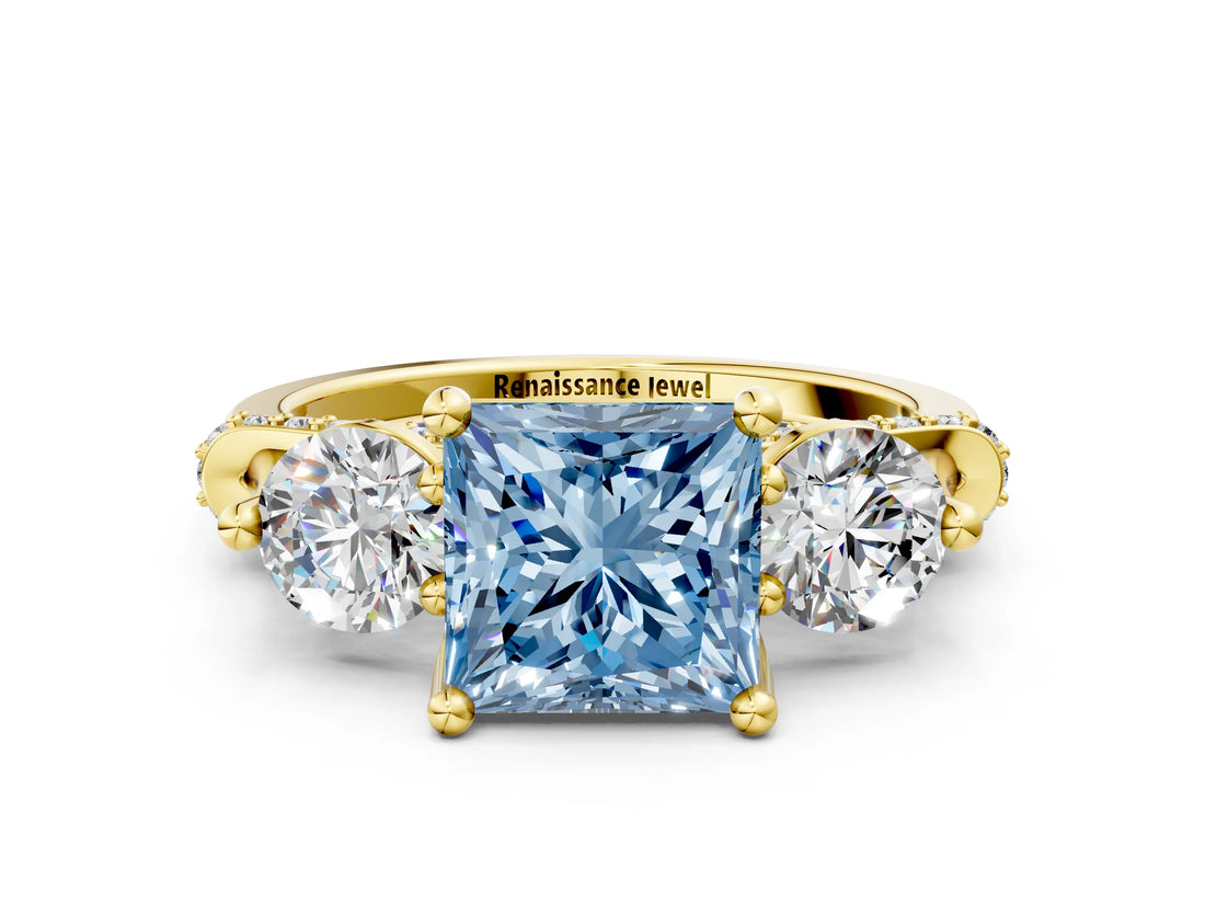 Yellow gold Fancy Blue Princess Cut Diamond Three-Stone Ring with Prong Setting and Pavé Band