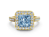 Yellow gold Fancy Blue Princess Cut Halo Diamond Ring with Pavé Band and Three-Prong Setting