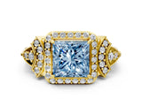 Yellow gold Fancy Blue Princess Cut Halo Diamond Split Shank Engagement Ring with Four-Prong Setting