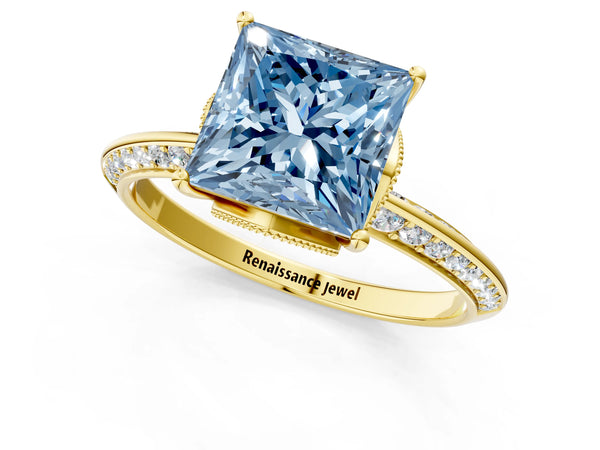Yellow gold Fancy Blue Princess Cut Solitaire Split Shank Pave Diamond Engagement Ring with Four-Prong Setting
