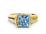 Yellow gold Fancy Blue Princess Cut Solitaire Tension Set Diamond Ring with Split Shank Band