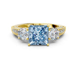Yellow gold Fancy Blue Princess Cut Three-Stone Diamond Ring with Pavé Band and Four-Prong Setting