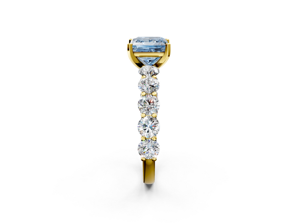 Yellow gold Fancy Blue Princess Cut Diamond Prong Setting with Side Stones on a Pave Band