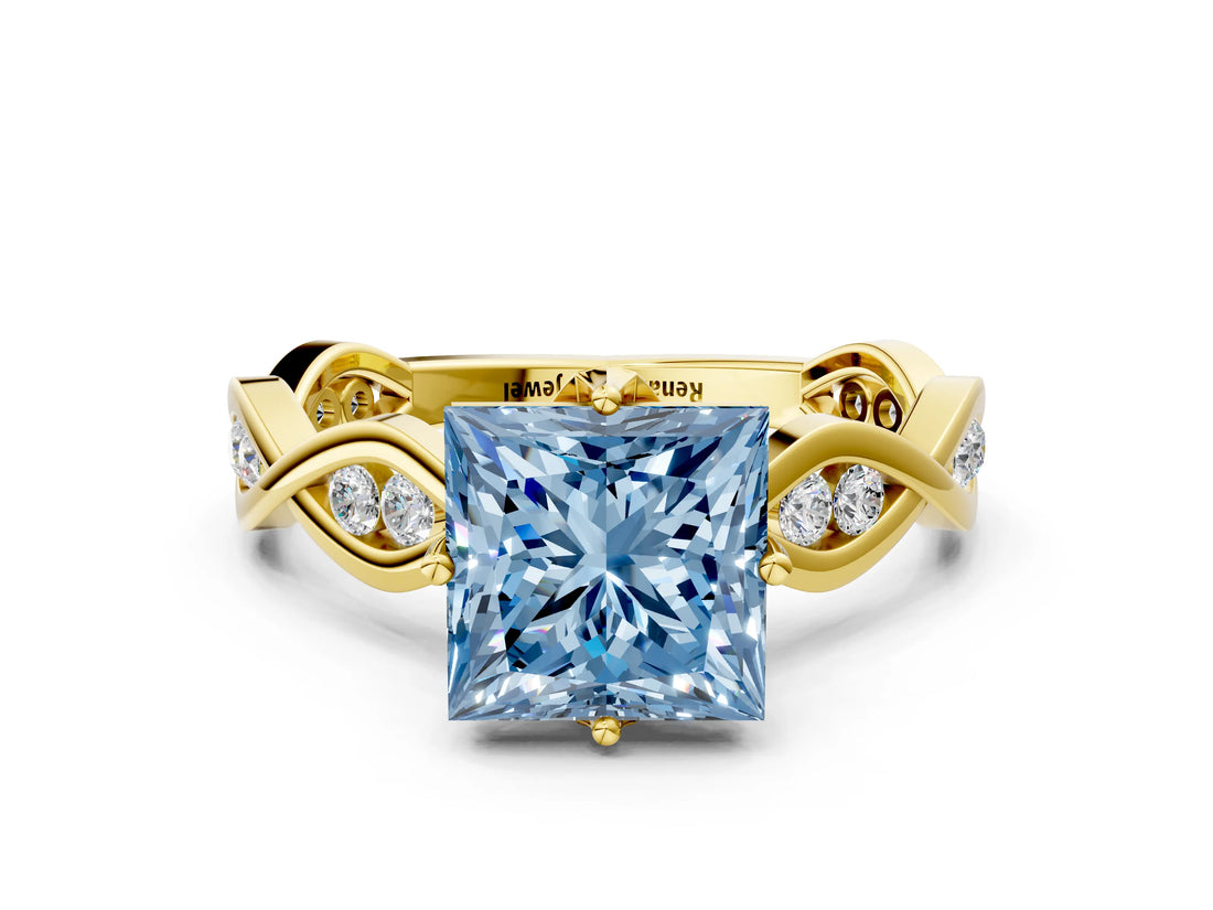 Yellow gold Fancy Blue Princess  Solitaire Twist Band with Leaf Prong Setting 1