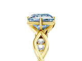 Yellow gold Fancy Blue Princess  Solitaire Twist Band with Leaf Prong Setting