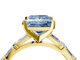 Yellow gold Fancy Blue Princess  Solitaire with Side Baguettes and Channel Set Band_49