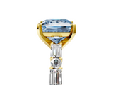 Yellow gold Fancy Blue Princess  Solitaire with Side Baguettes and Channel Set Band_50