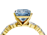Yellow gold Fancy Blue Princess  Solitaire with Side Stones on a Pavé Band and Four-Prong Setting_27