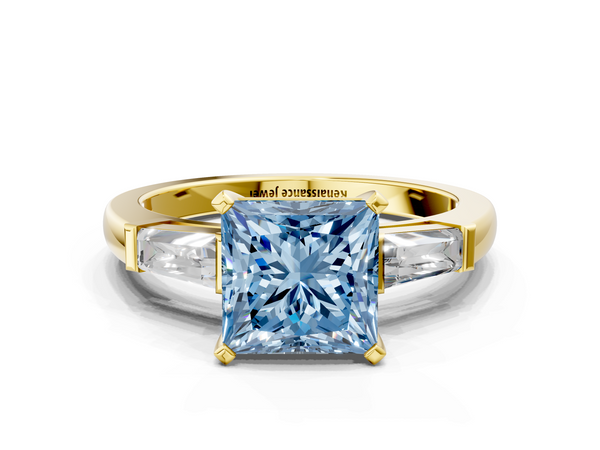 Yellow gold Fancy Blue Princess  Solitaire with Tapered Baguette Side Stones on a Classic Band with Four-Prong Setting