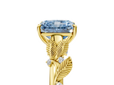 Yellow gold Fancy Blue Radiant  Brilliant Solitaire with Leaf Motif Band and Four-Prong Setting_67