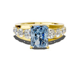 Yellow gold Fancy Blue Radiant  Brilliant Solitaire with Side Stones on a Pave Band and Four-Prong Setting_30
