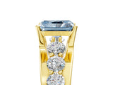Yellow gold Fancy Blue Radiant  Brilliant Solitaire with Side Stones on a Pave Band and Four-Prong Setting_35