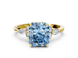 Yellow gold Fancy Blue Radiant Cut Brilliant Diamond Solitaire Ring with Pear Side Stones and Four-Prong Setting_3