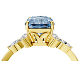 Yellow gold Fancy Blue Radiant Cut Brilliant Diamond Solitaire Ring with Pear Side Stones and Four-Prong Setting_7