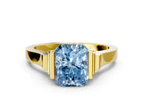 Yellow gold Fancy Blue Radiant Cut Brilliant Solitaire Diamond Ring with Channel Set Band and Bar Prong Setting