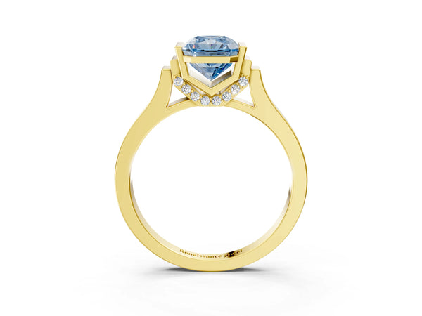 Yellow gold Fancy Blue Radiant Cut Brilliant Solitaire Diamond Ring with Channel Set Band and Bar Prong Setting