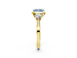 Yellow gold Fancy Blue Radiant Cut Brilliant Three-Stone Diamond Ring with Pavé Band and Four-Prong Setting_5