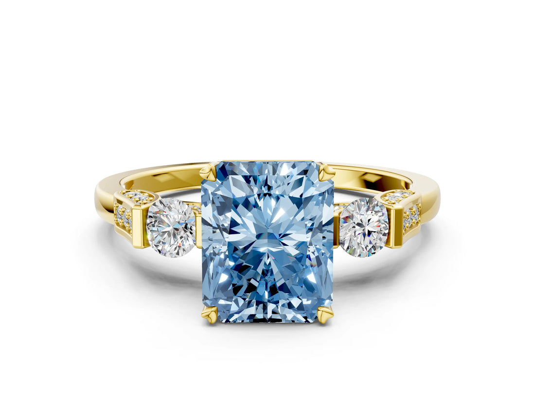 Yellow gold Fancy Blue Radiant Cut Brilliant Three-Stone Pave Band with Four-Prong Setting