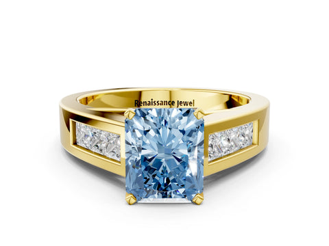 Yellow gold Fancy Blue Radiant Cut Cut Channel Set Solitaire Ring with Four-Prong Setting