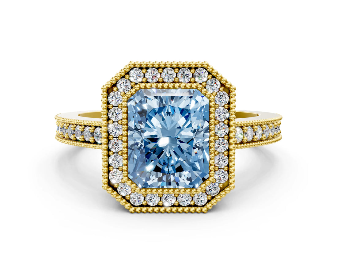 Yellow gold Fancy Blue Radiant Cut-Cut Diamond Halo Engagement Ring with Pave Band and Prong Setting