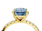 Yellow gold Fancy Blue Radiant Cut Diamond Brilliant Solitaire Ring with Pavé Band and Four-Prong Setting_16