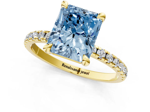 Yellow gold Fancy Blue Radiant Cut Diamond Brilliant Solitaire Ring with Pavé Band and Four-Prong Setting_1