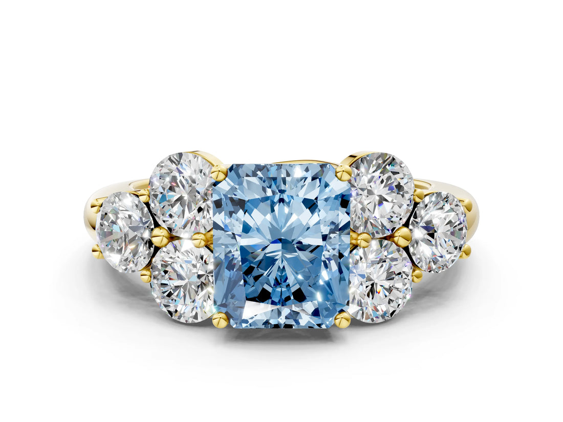 Yellow gold Fancy Blue Radiant  Cut Diamond Cluster Ring with Round Accent Stones and Prong Setting on a Classic Band_48