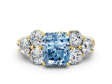 Yellow gold Fancy Blue Radiant  Cut Diamond Cluster Ring with Round Accent Stones and Prong Setting on a Classic Band_48