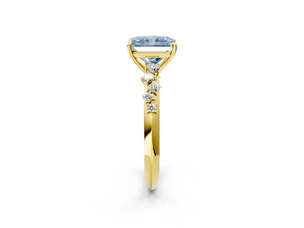 Yellow gold Fancy Blue Radiant Cut Diamond Cluster Side Stone Solitaire Ring with Prong Setting