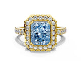 Yellow gold Fancy Blue Radiant Cut Diamond Halo Ring with Pavé Band and Prong Setting
