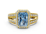 Yellow gold Fancy Blue Radiant Cut Diamond Halo Ring with Split Shank Pavé Band and Four-Prong Setting