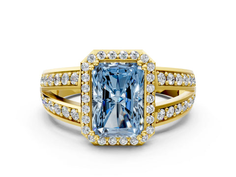 Yellow gold Fancy Blue Radiant Cut Diamond Halo Ring with Split Shank Pavé Band and Four-Prong Setting