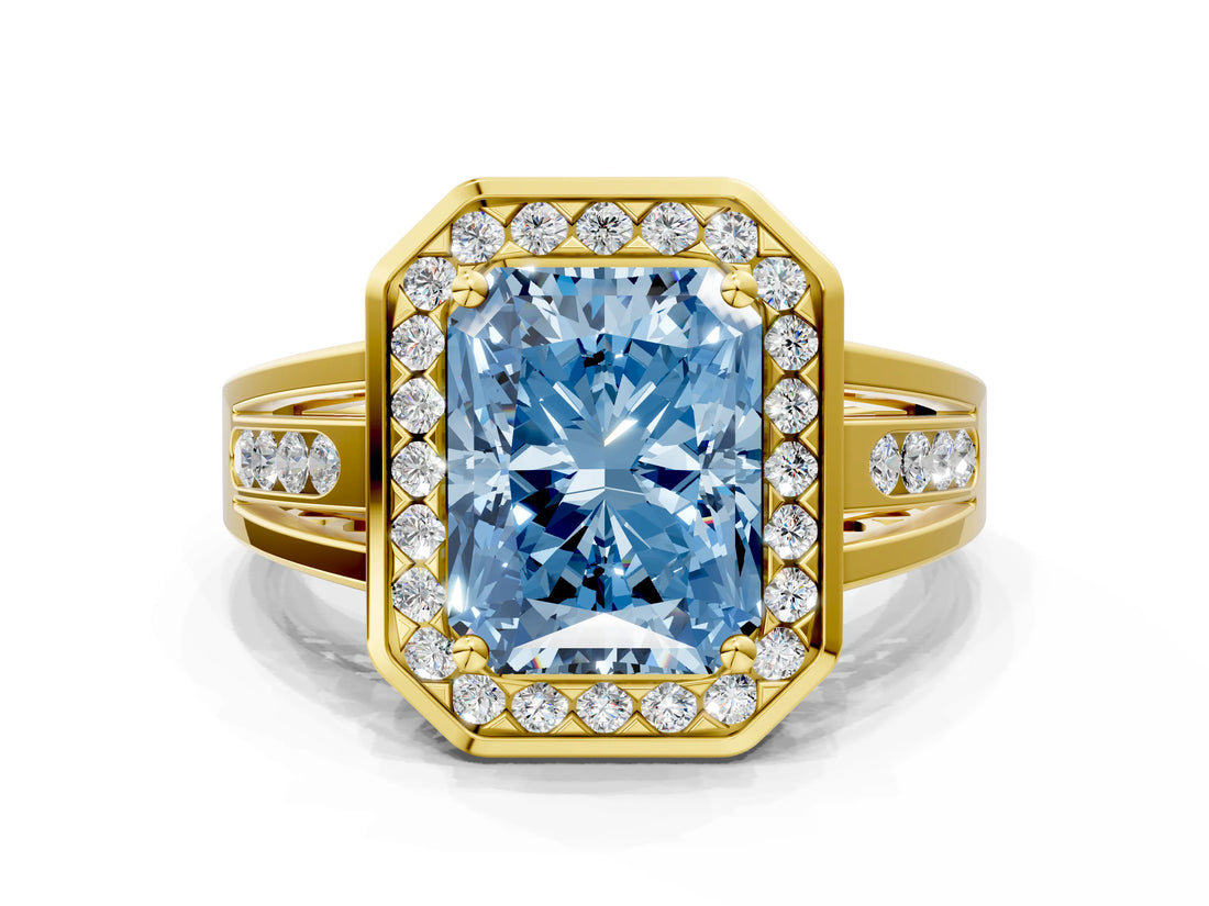 Yellow gold Fancy Blue Radiant Cut Diamond Halo Ring with Split Shank and Bezel Accents and Prong Setting