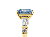 Yellow gold Fancy Blue Radiant  Cut Diamond Ring with Baguette Side Stones, Channel Set Band, and Four-Prong Setting_8
