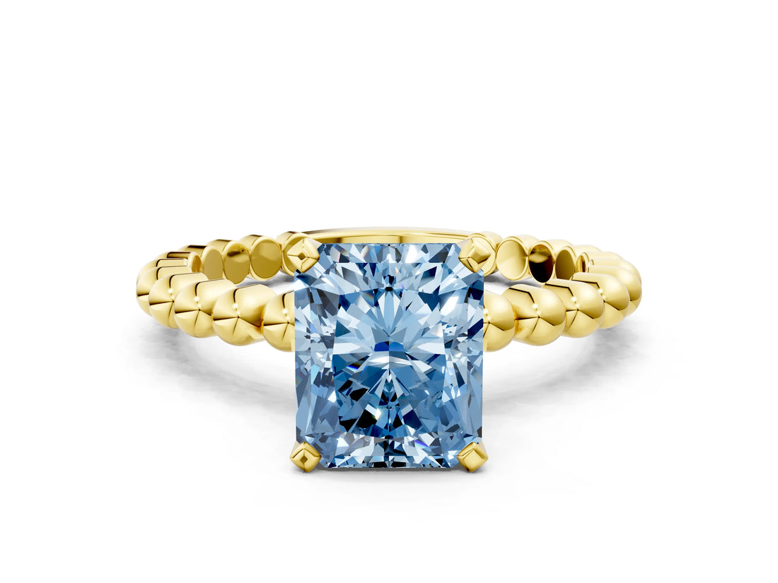 Yellow gold Fancy Blue Radiant Cut Diamond Solitaire Ring with Beaded Band and Prong Setting_296
