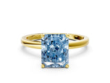 Yellow gold Fancy Blue Radiant Cut Diamond Solitaire Ring with Classic Band and Four-Prong Setting