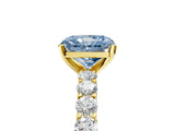Yellow gold Fancy Blue Radiant Cut Diamond Solitaire Ring with Shared Prong Pavé Band and Four-Prong Setting_62