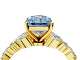 Yellow gold Fancy Blue Radiant Cut Diamond Solitaire Ring with Side Stones and Four-Prong Setting_53