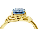 Yellow gold Fancy Blue Radiant Cut Diamond Solitaire Ring with Twist Band and Four-Prong Setting_95