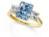 Yellow gold Fancy Blue Radiant Cut Diamond Three-Stone Engagement Ring with Prong Setting and Pavé Band_1