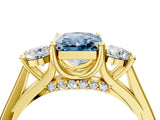 Yellow gold Fancy Blue Radiant Cut Diamond Three-Stone Engagement Ring with Prong Setting and Pavé Band_4