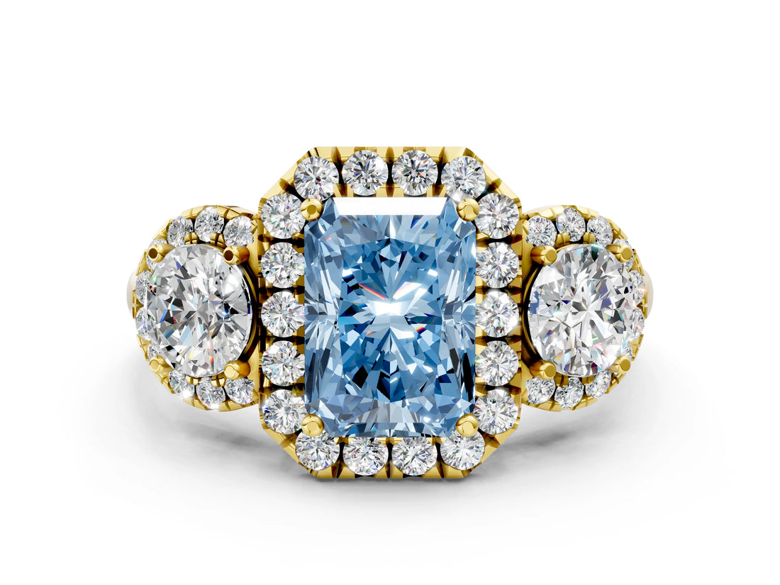 Yellow gold Fancy Blue Radiant Cut Diamond Three-Stone Halo Ring with Prong Setting and Pavé Accents