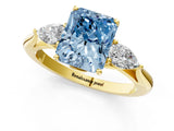 Yellow gold Fancy Blue Radiant Cut Diamond Three-Stone Ring with Pear Side Stones and Four-Prong Setting_60